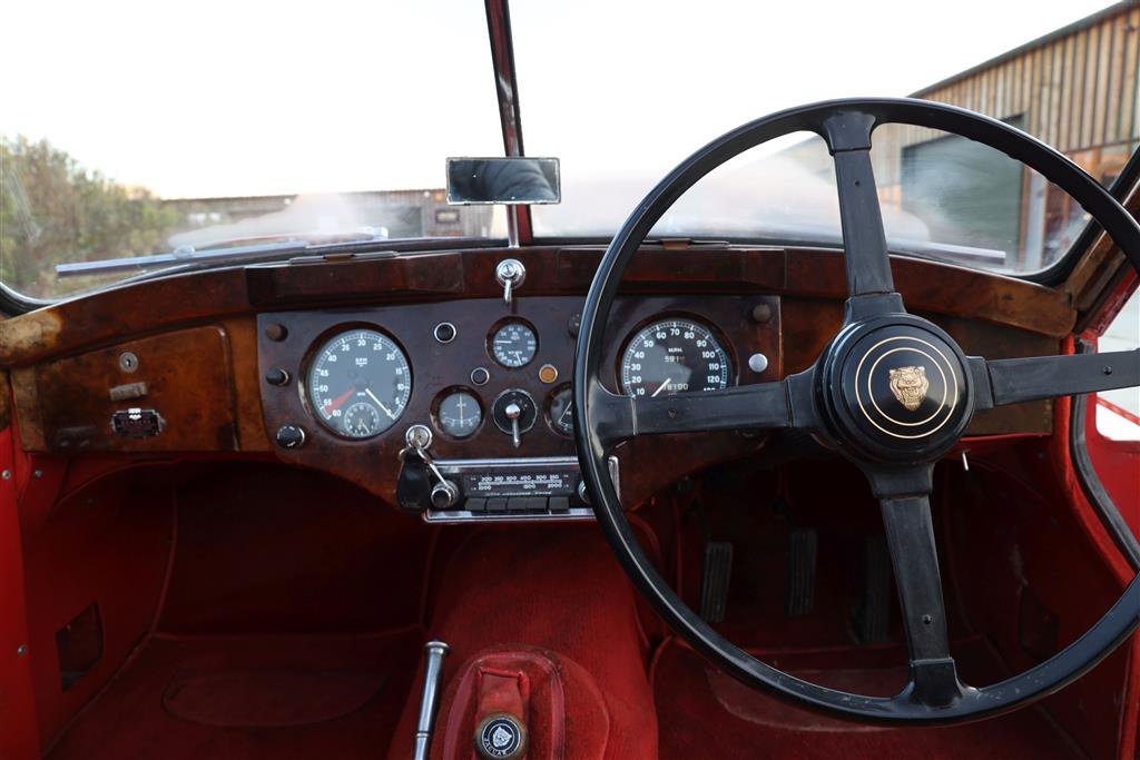 A 1955 Jaguar XK140 DHC